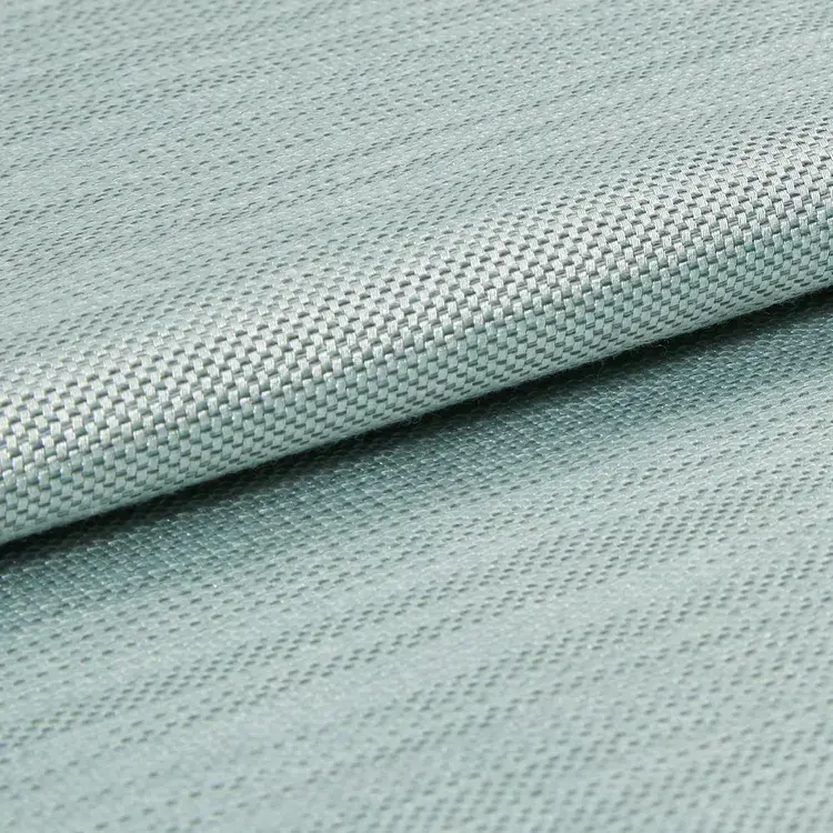 Close-up of light blue teal woven silky fabric.