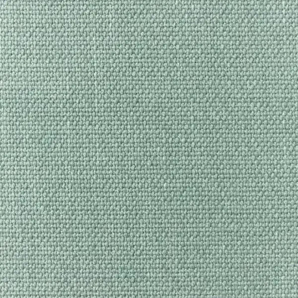 Close-up of light sage green textured woven fabric.