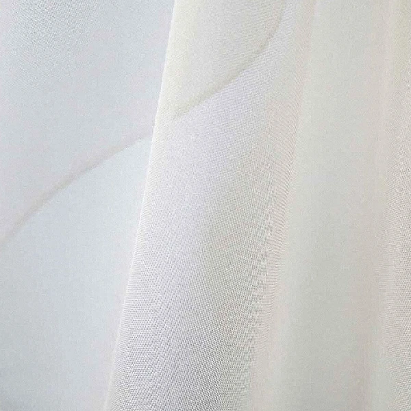 White sheer curtain with fine textured weave